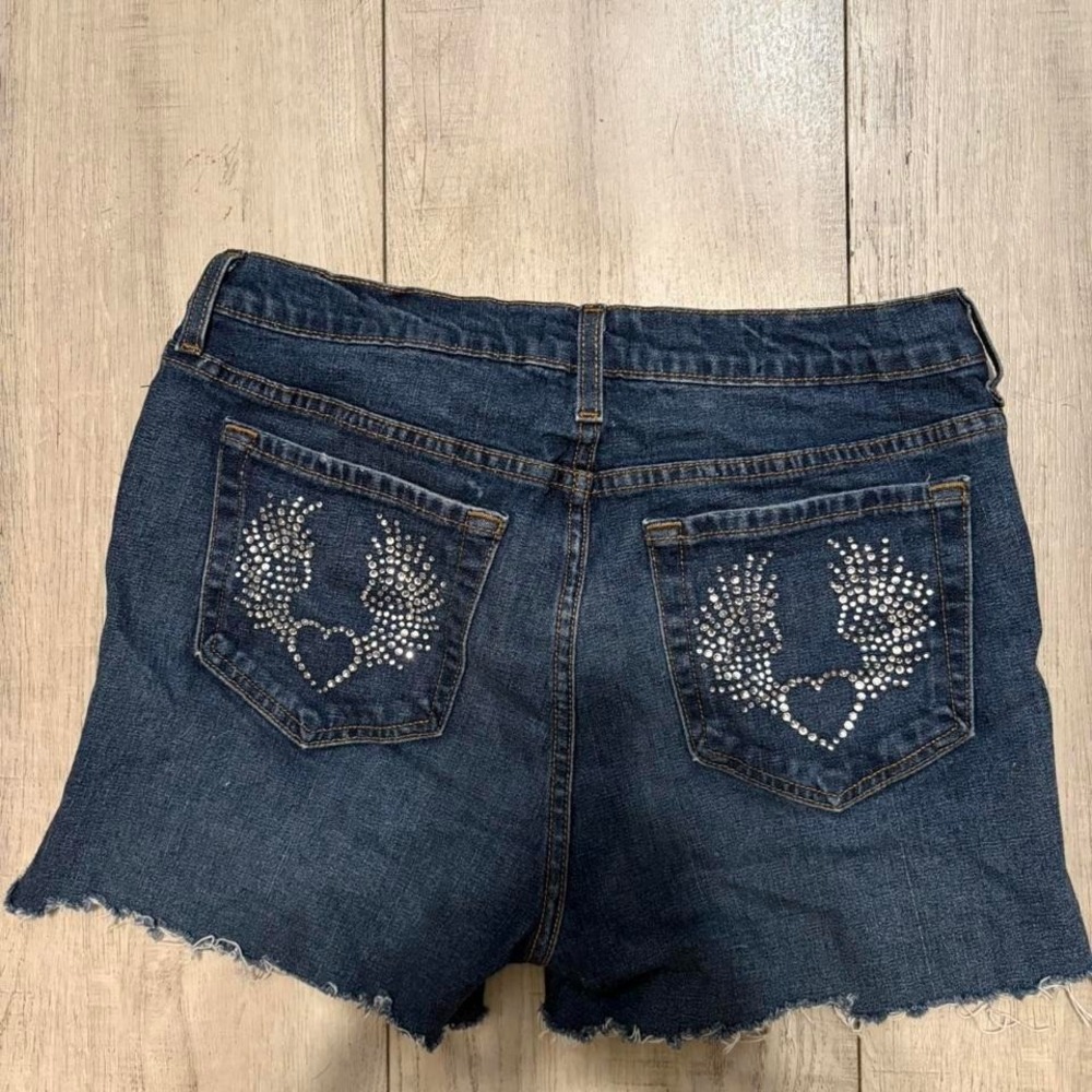 denim shorts with rhinestone heart and wing design on back pockets, woman size 8